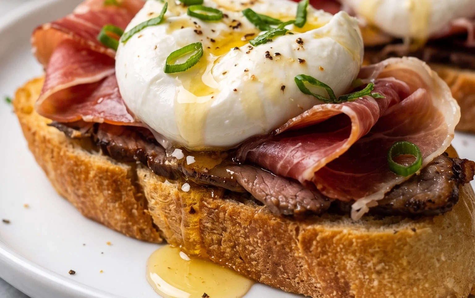 Beef Prosciutto Crostini with Burrata and Lemon Honey Drizzle